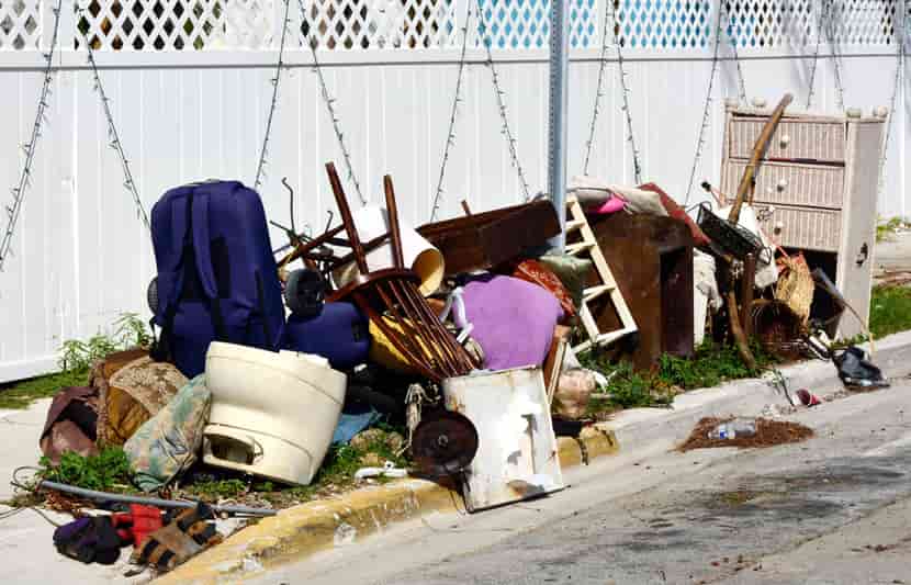 Pile of junk in front of house in ventura county california